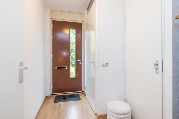 Foto - Te koop: Tussenwoning uit 2007 voorzien van een energielabel A met onder meer een ruime woon- en eetkamer, semi-open keuken, 3 slaapkamers, badkamer, carport en besloten (voor)tuin in Ransdaal